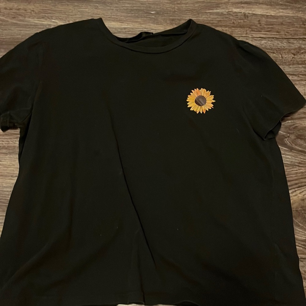 Black crop top with sunflower on it